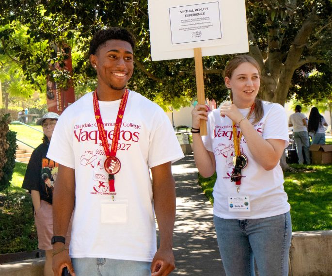 GCC students walking by the fountain.