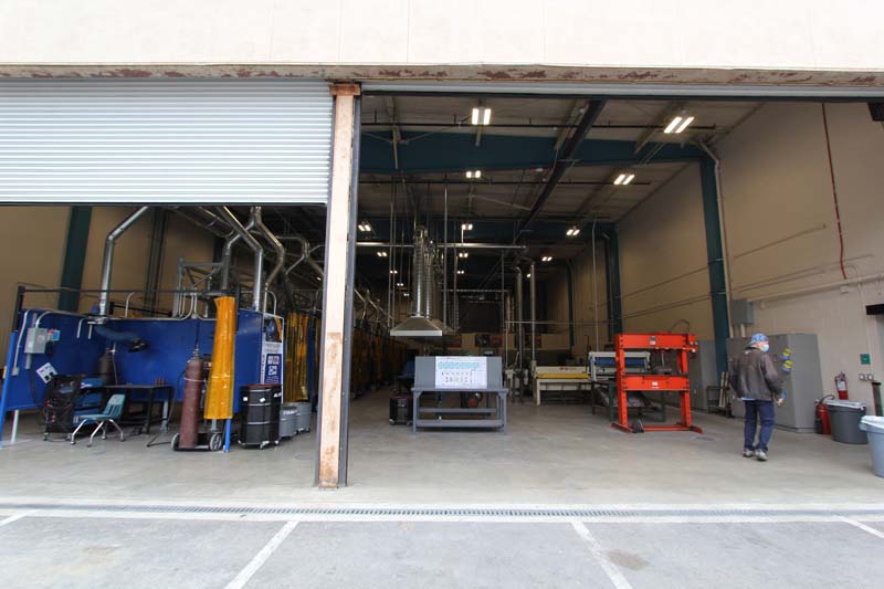 Overview of Instructors Demonstration Booth and showing Hydraulic Press, also our Shear